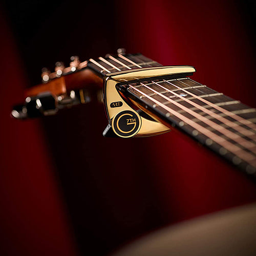 Experience Ultimate Performance with ART Steel String 18kt Gold Plate Capo