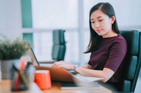 Woman working on laptop