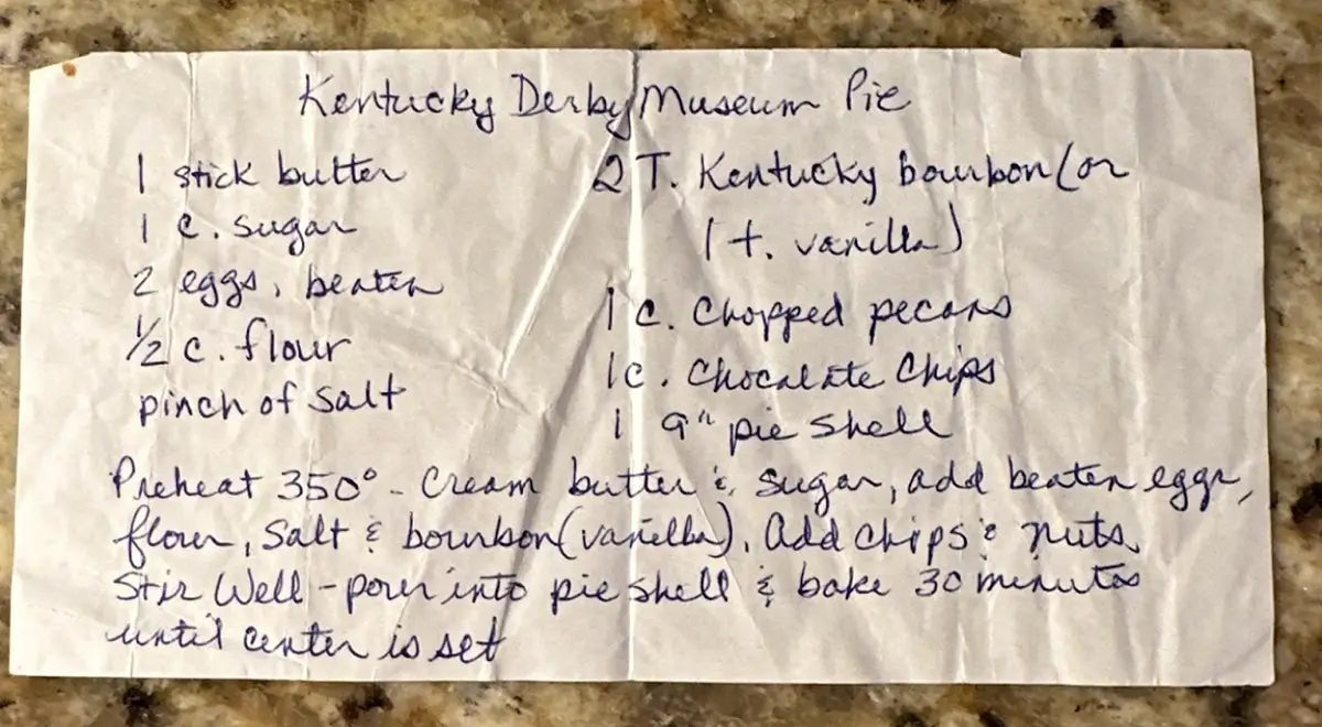 photo of an old recipe card with the original Kentucky Derby Museum Pie recipe on it