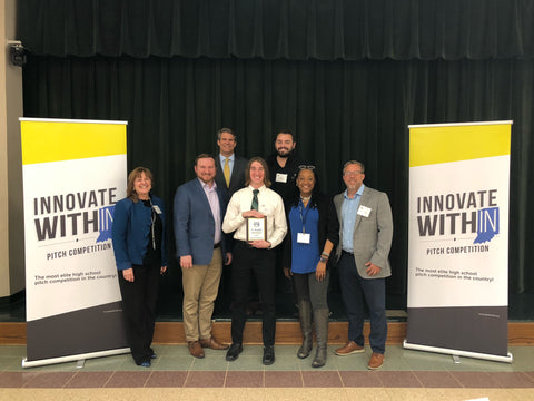 Lextin Willis, Region 7 Innovate WithIN competition winner, with the six local business leader judges