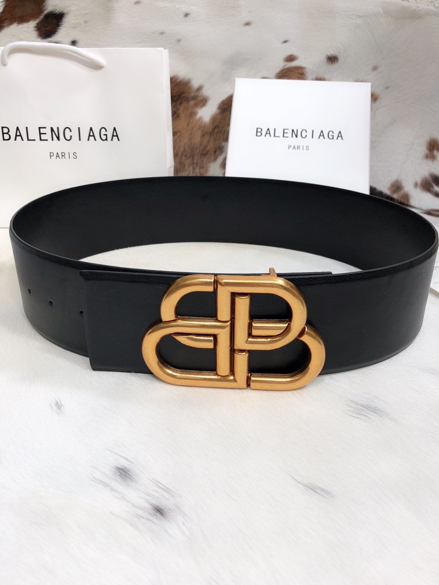 Balenciaga sells gold buckle fashion belts for fashionable ladie