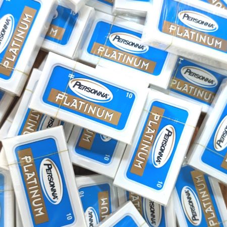 large pile of Personna razor blade packets