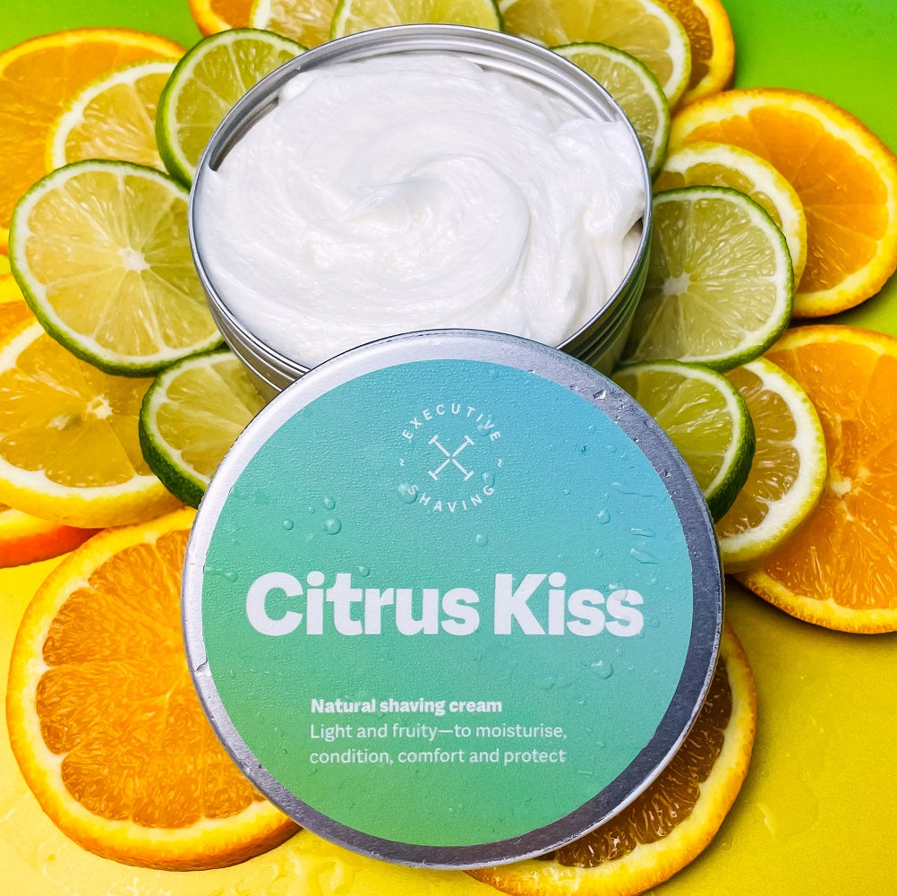 Executive Shaving citrus kiss cream surrounded by limes