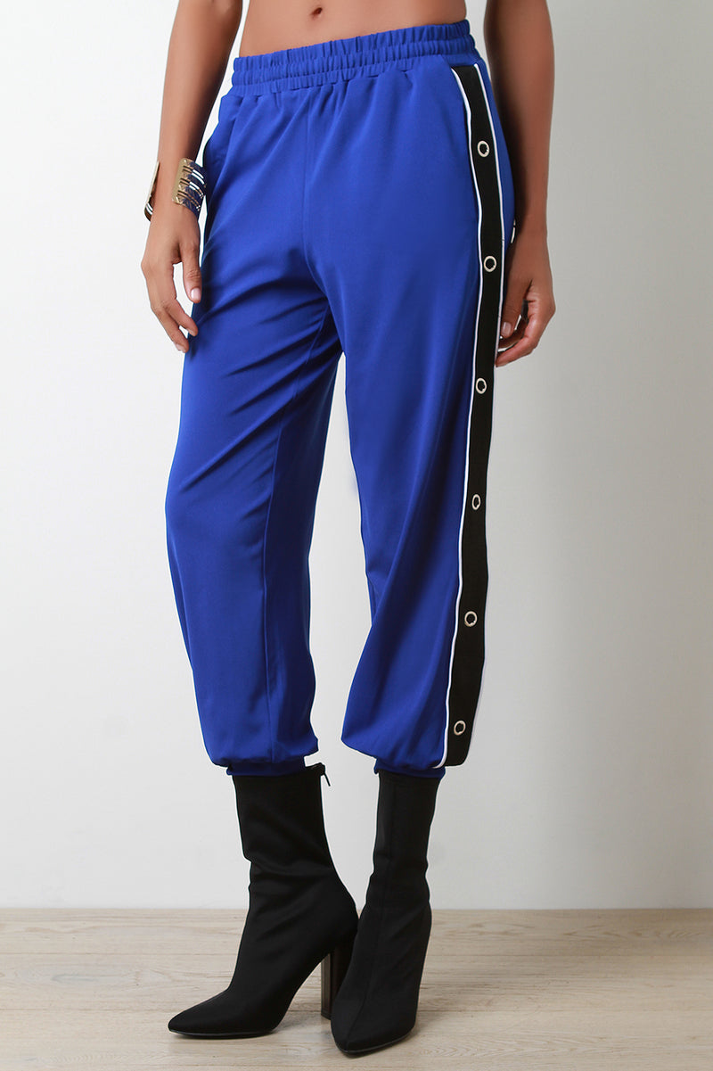 jogging pants with buttons on the side