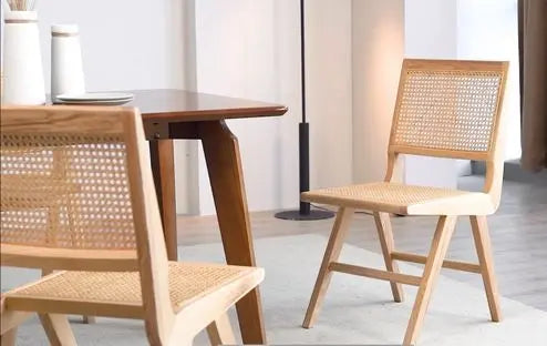 Natural Wood Cane Chair beside solid wood table