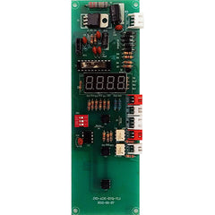 Control board for ADK tankless water heater with exposed chips and connectors.