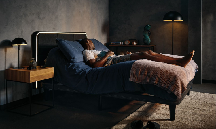 Man sleeping with head elevated in the ErgoSportive smart bed
