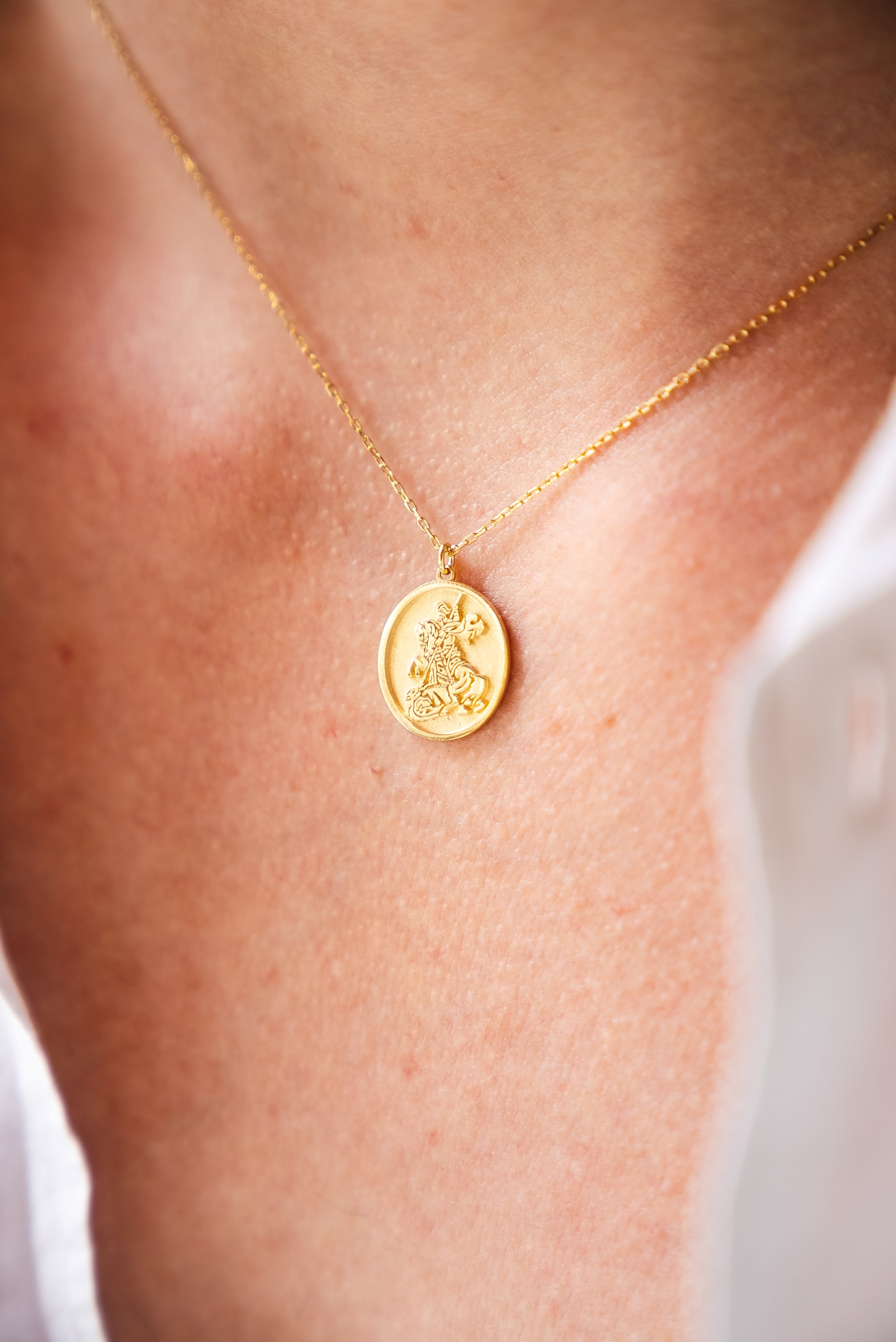 st george necklace gold