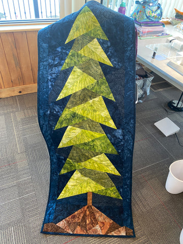 Essentially Loved Quilts blog post on the many types of quilts foundation paper pieced evergreen tree