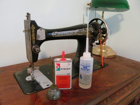 Vintage Sewing machine and oil for cleaning and maintenance