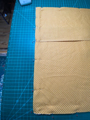 Pinned edges of envelope pillow cover before sewing