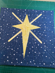Finished Christmas Star Pillow Cover using turned out version