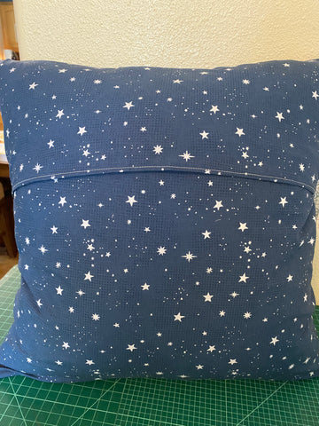 Envelope Pillow Cover back. Overlap is split 1/3 from top. Fabric is white stars on navy background