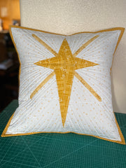 Christmas Star Pillow envelope pillow cover with binding; white background with gold star and binding