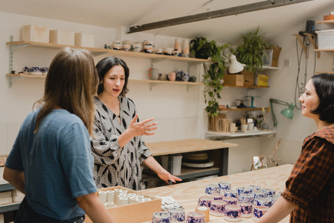 Three women in a ceramics studio