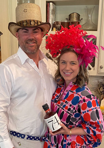 Abbey Ferguson and her husband in their Kentucky Derby hats