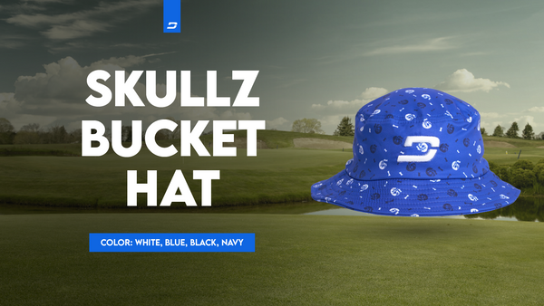 Blue Skullz bucket hat with white logo and pattern, showcased on a golf course background.