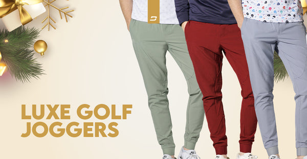 Druids Luxe Golf Joggers in shades of green, red, and grey, arranged with festive decorations, suitable for the holiday season.