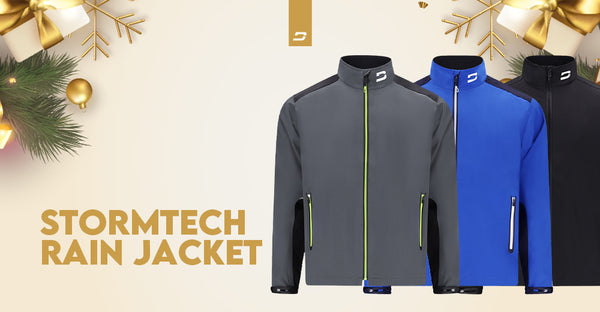 Druids Stormtech Rain Jackets in grey with lime green accents, blue, and black, featured with a Christmas theme.