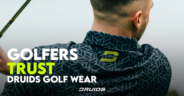 A golfer from the back wearing a patterned golf jacket with a logo, holding a golf club, with the text "GOLFERS TRUST DRUIDS GOLF WEAR.