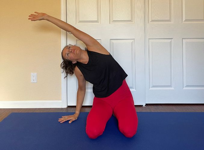 Side Bend with Arm Overhead 1 Yoga for Digestion