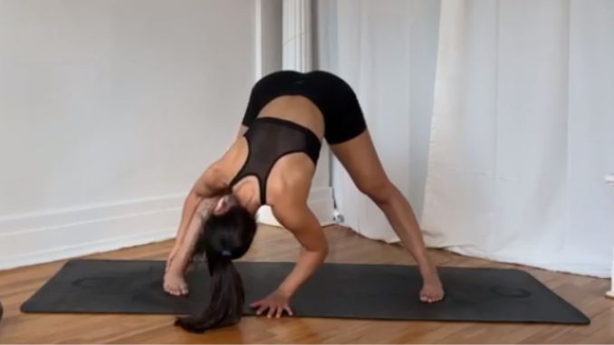 Wide Legged Forward Fold Pose Side Stretch