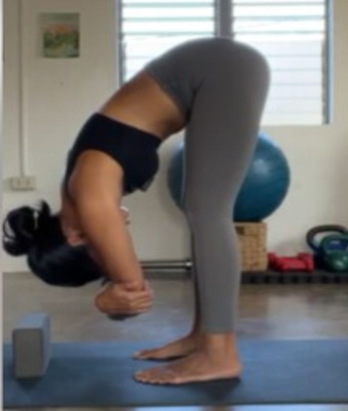 forward fold - Yoga for Lower Back