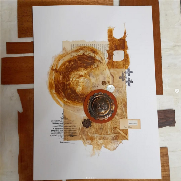 An abstract rust study using rice papers and found objects