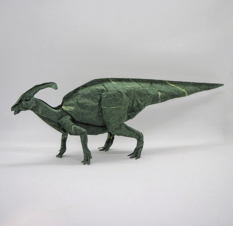 Green origami dinosaur
