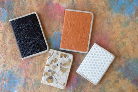 Four books with kozo papers as a cover.