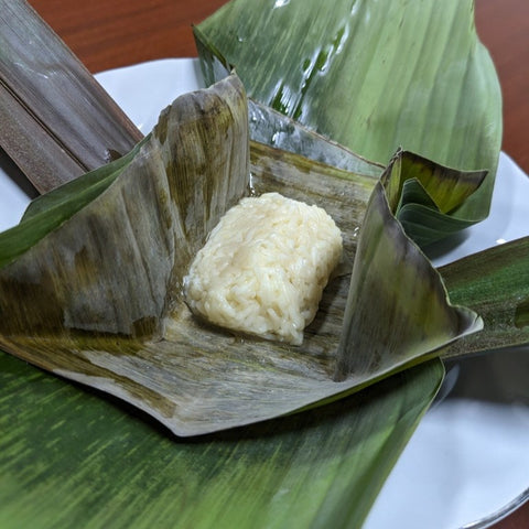 Sweet fermented rice in banana leaves