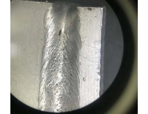 Collapses and pits not only mar the surface but can also introduce weak points in the weld