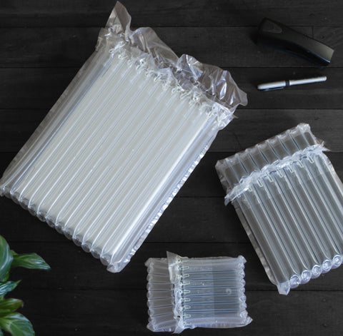 transparent Packpal air column packaging on a black table