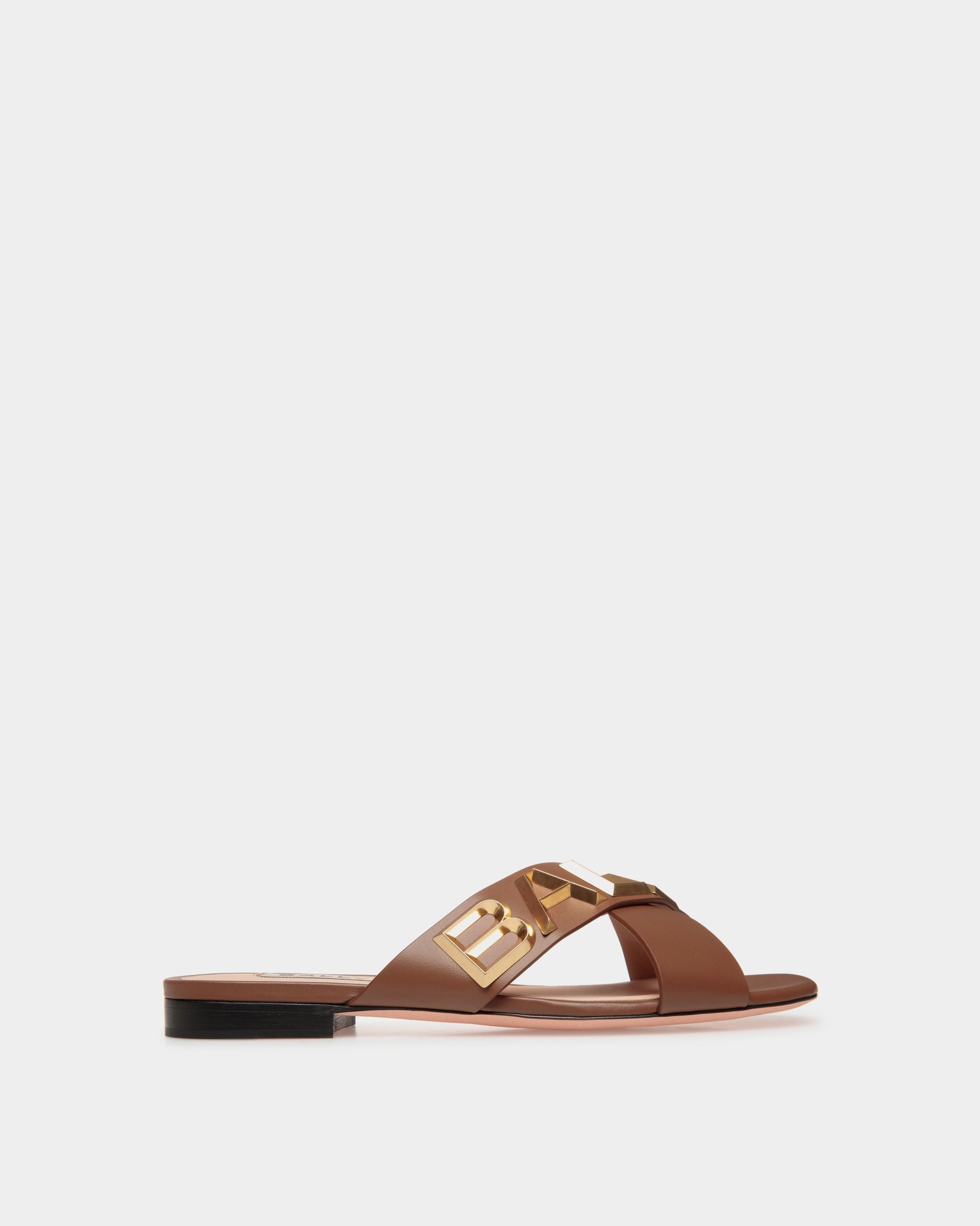 Bally Spell | Women's Flat Slide in Brown Leather | Bally | Still Life Side