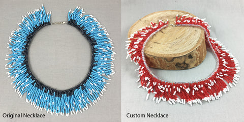 Blue fringe necklace beside red fringe necklace