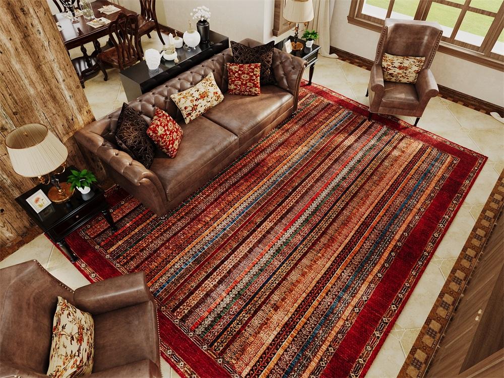 Rugitall Stripy World Red & Burgundy Rug in living room with leather coach and armchairs aside