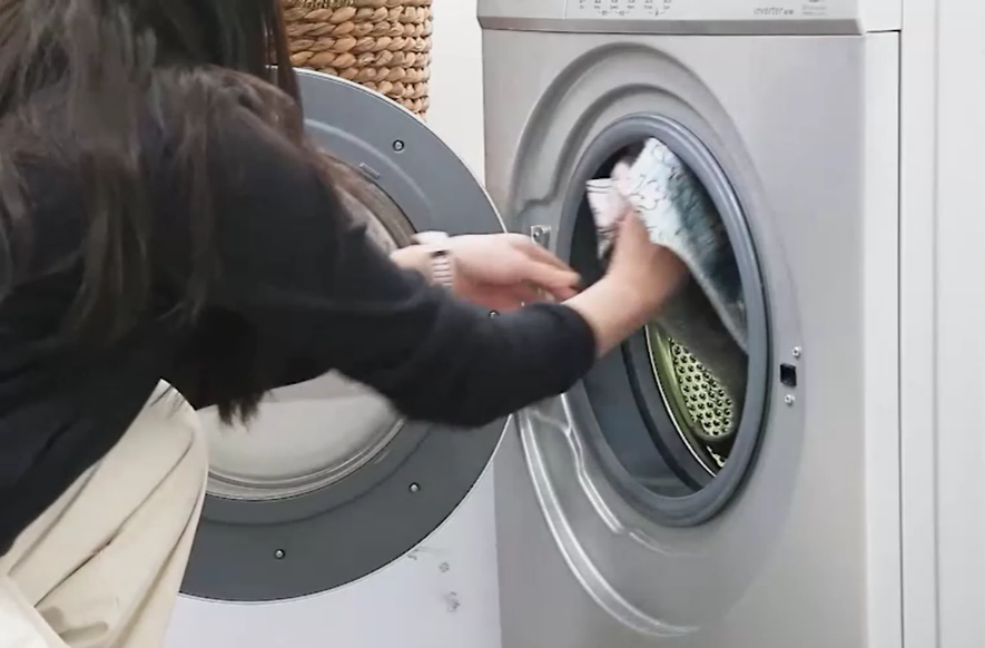 Toss the upper rug cover in the washer.
