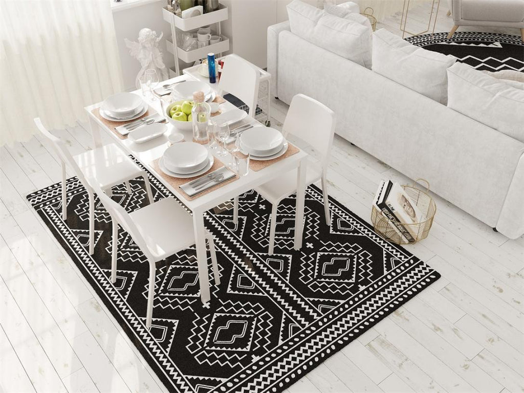 Rugitall Spellbound Mind Black & White Rug under white dining table