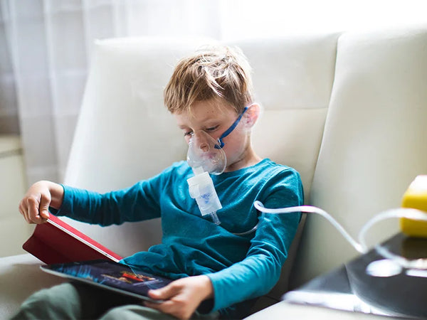 Child with nebulizer 