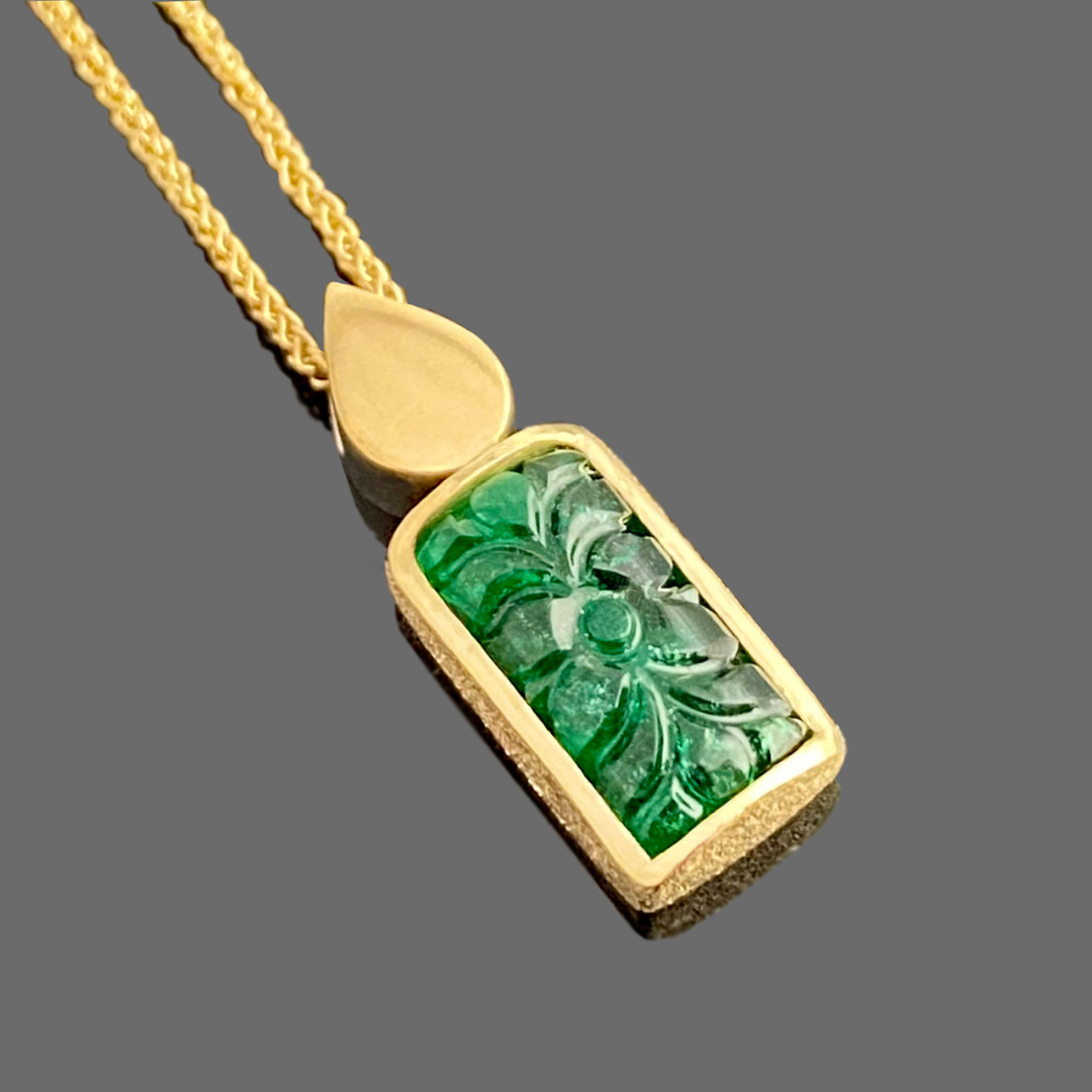 18ct yellow gold and carved emerald 'candle' pendant