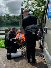 Ben and Oscar talking to Bridget whilst planning a dive for Open Water course