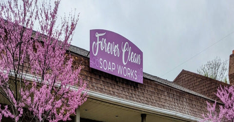 Forever Clean Soap Works sign on top of building.