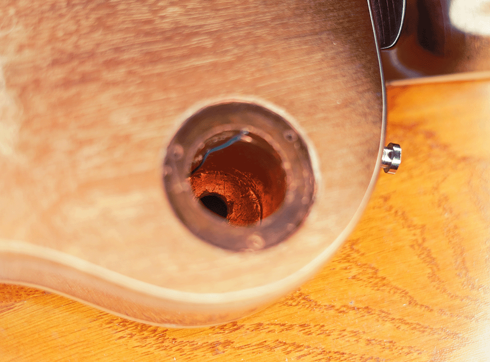 photo of the shielded switch cavity with a wire attached