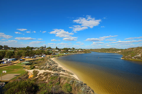 In a blue sky, white clouds, experience easy 4WD tracks at Moore River. 