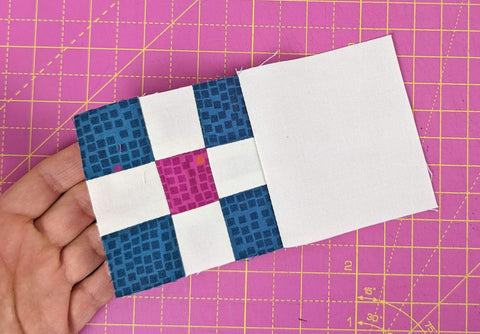 9-patch block sewn with a solid block