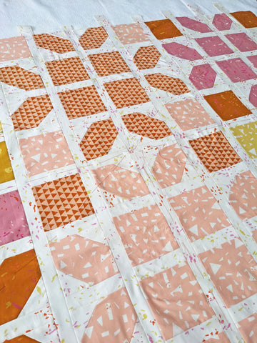 Thread basting quilt top