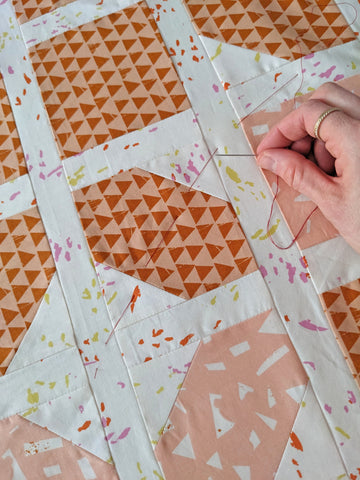 Thread basting sandwich quilt top tutorial for beginners