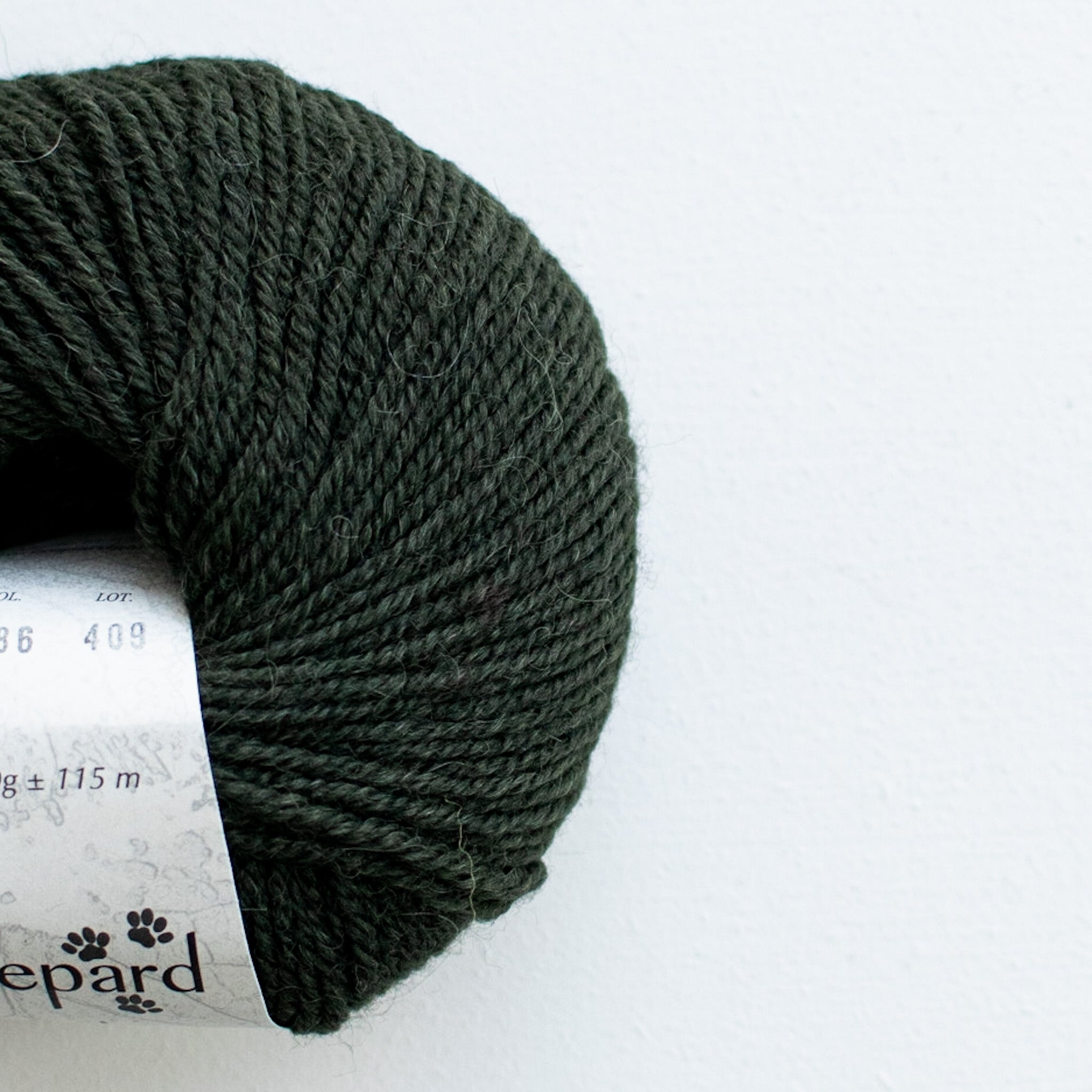 Se Pura Lana: Skovgrøn (886) hos Wool Collective