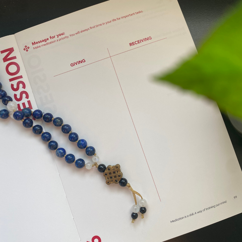 My Meditation Marathon Journal with a Buddhist mala