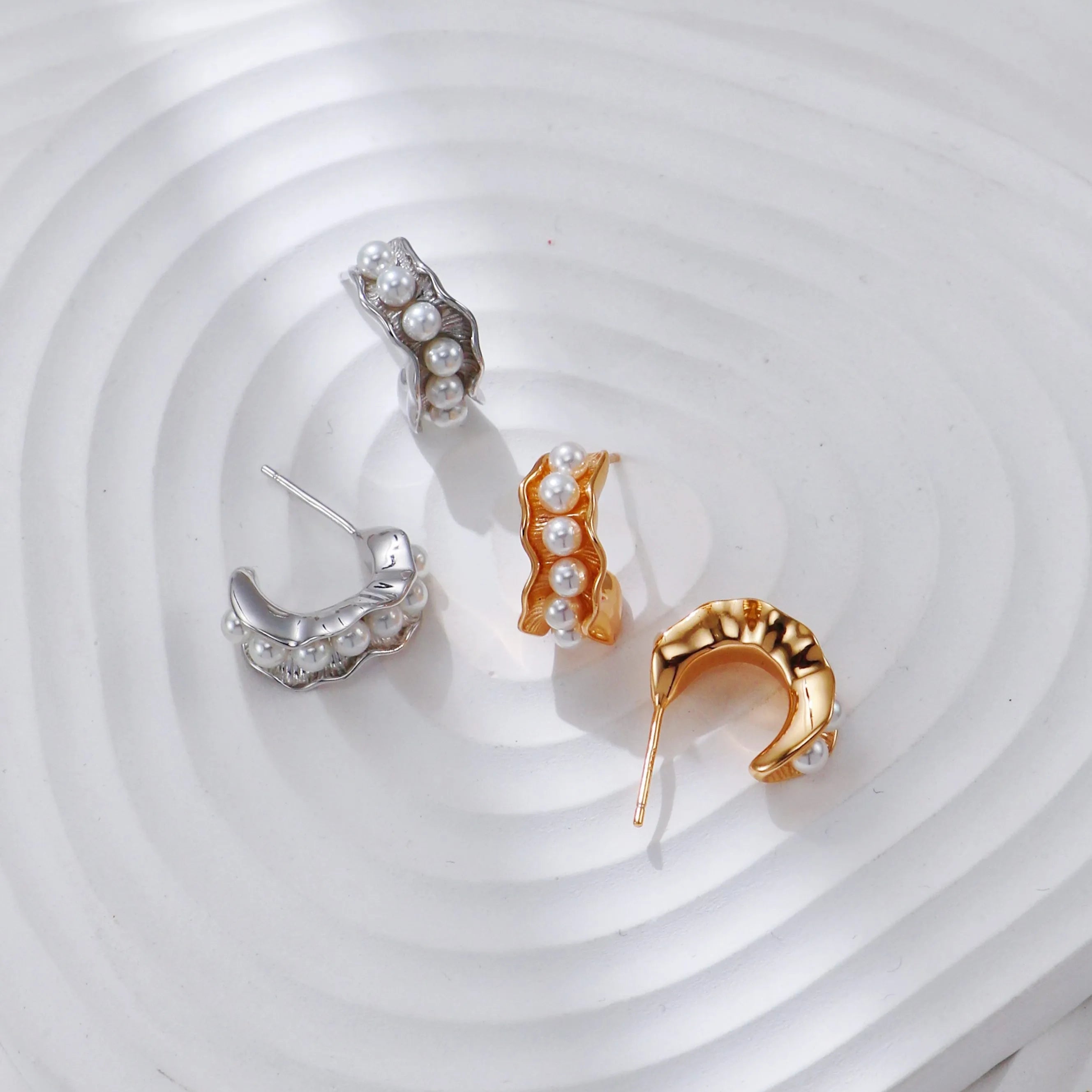 A platform with s925 earrings on it.